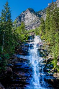 Preview wallpaper waterfall, rocks, stream, trees, water