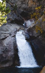 Preview wallpaper waterfall, rocks, stream, water, branches