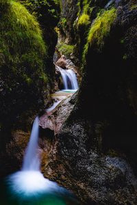 Preview wallpaper waterfall, rocks, stream, water, grass