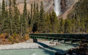 Preview wallpaper waterfall, rocks, trees, bridge, river