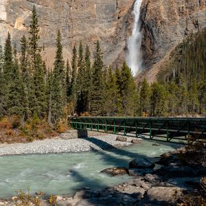 Preview wallpaper waterfall, rocks, trees, bridge, river