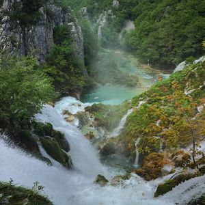 Preview wallpaper waterfall, rocks, trees, cliff, landscape