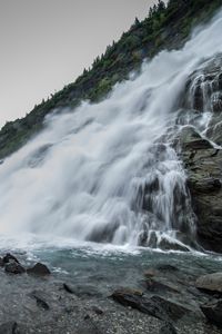 Preview wallpaper waterfall, splashes, stones, mountains, clouds