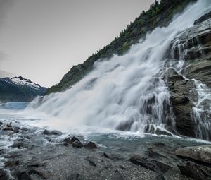 Preview wallpaper waterfall, splashes, stones, mountains, clouds