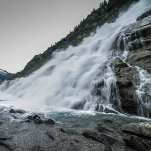 Preview wallpaper waterfall, splashes, stones, mountains, clouds