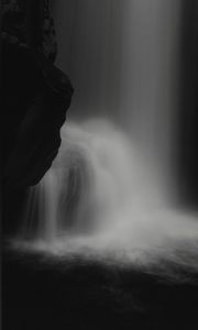 Preview wallpaper waterfall, stone, water, black and white, dark