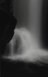 Preview wallpaper waterfall, stone, water, black and white, dark