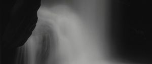 Preview wallpaper waterfall, stone, water, black and white, dark