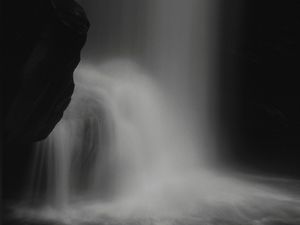 Preview wallpaper waterfall, stone, water, black and white, dark