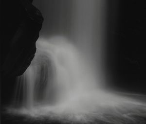 Preview wallpaper waterfall, stone, water, black and white, dark