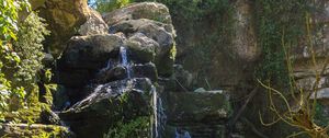 Preview wallpaper waterfall, stones, branches, nature