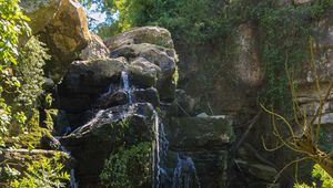 Preview wallpaper waterfall, stones, branches, nature