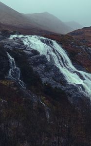 Preview wallpaper waterfall, stones, cliff, trees, autumn