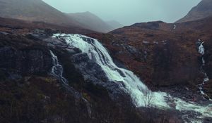 Preview wallpaper waterfall, stones, cliff, trees, autumn