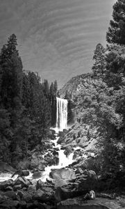 Preview wallpaper waterfall, stones, cliff, trees, black and white