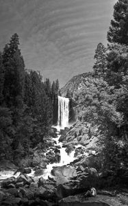 Preview wallpaper waterfall, stones, cliff, trees, black and white