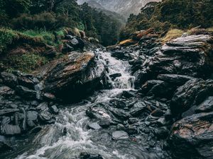 Preview wallpaper waterfall, stones, current, grass, mountains