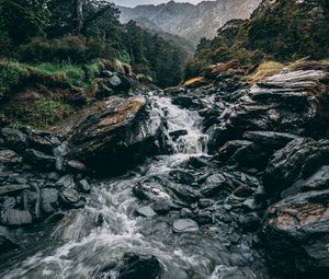 Preview wallpaper waterfall, stones, current, grass, mountains