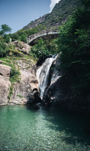 Preview wallpaper waterfall, stones, lake, glare, bridge