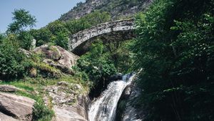 Preview wallpaper waterfall, stones, lake, glare, bridge