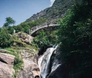 Preview wallpaper waterfall, stones, lake, glare, bridge