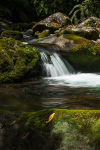 Preview wallpaper waterfall, stones, moss, water, plants