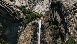 Preview wallpaper waterfall, stones, rocks, branches, cliff