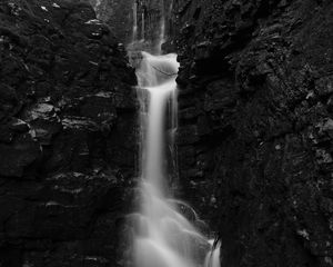 Preview wallpaper waterfall, stones, splashes, dark, black and white