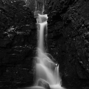 Preview wallpaper waterfall, stones, splashes, dark, black and white