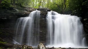 Preview wallpaper waterfall, stones, spray, logs, nature