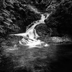 Preview wallpaper waterfall, stones, water, black and white, trees