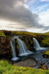 Preview wallpaper waterfall, stream, rock, grasses, horizon