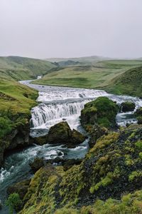 Preview wallpaper waterfall, stream, stones, distance