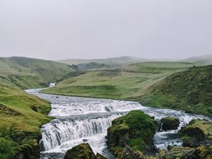 Preview wallpaper waterfall, stream, stones, distance