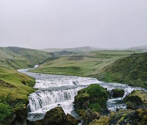 Preview wallpaper waterfall, stream, stones, distance