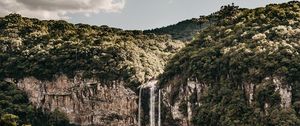 Preview wallpaper waterfall, trees, cliff, sky, clouds