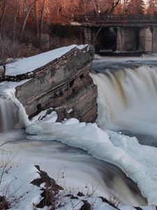 Preview wallpaper waterfall, water, river, stones, snow, winter, nature