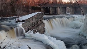 Preview wallpaper waterfall, water, river, stones, snow, winter, nature