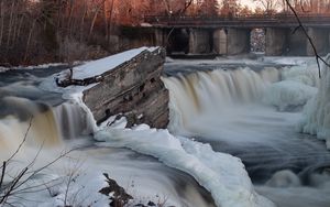 Preview wallpaper waterfall, water, river, stones, snow, winter, nature