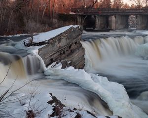 Preview wallpaper waterfall, water, river, stones, snow, winter, nature