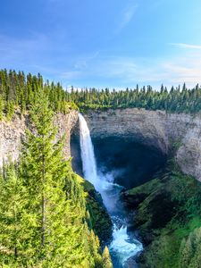 Preview wallpaper waterfall, water, rock, spruce, trees, sky