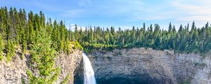 Preview wallpaper waterfall, water, rock, spruce, trees, sky