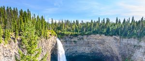 Preview wallpaper waterfall, water, rock, spruce, trees, sky