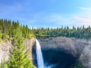 Preview wallpaper waterfall, water, rock, spruce, trees, sky