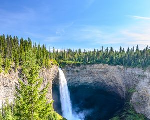 Preview wallpaper waterfall, water, rock, spruce, trees, sky