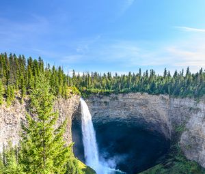 Preview wallpaper waterfall, water, rock, spruce, trees, sky