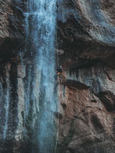 Preview wallpaper waterfall, water, rock, rock climber