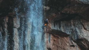 Preview wallpaper waterfall, water, rock, rock climber