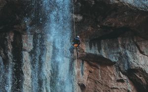 Preview wallpaper waterfall, water, rock, rock climber