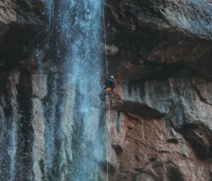 Preview wallpaper waterfall, water, rock, rock climber